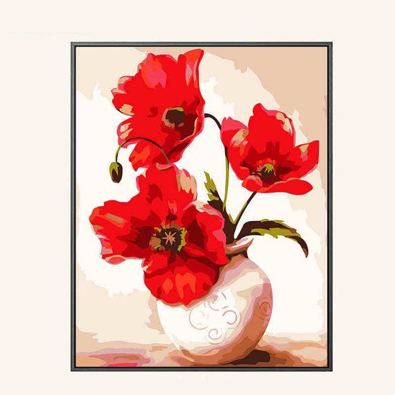 Flores rojas en un jarrón